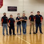 archery students with trophy
